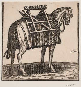 A yet unloaded packhorse with a carrying frame on its back, seen obliquely from behind to the right