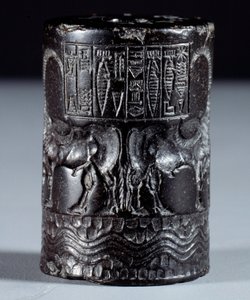 Mesopotamia: Cylindrical Seal in Black Marble in the Name of the Divine Sharkali-Sharri by Mesopotamian Mesopotamian