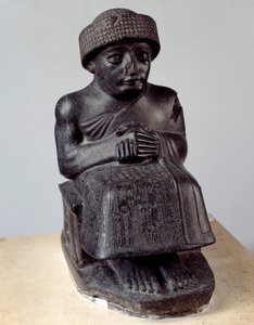 Mesopotamia: statue of the god Ningishzida representing Gudea sitting, prince of Lagash. Neo-Sumerian period (ca. 2150-2000 BC)