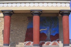 Minoan archaeological site of Knossos. North entrance, North pillar Hall. Bastion reconstructed by Arthur Evans with a copy of a restored relief fresco of a bull. Knossos, Crete by Minoan