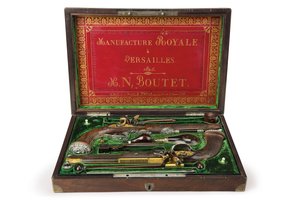 A pair of silver-mounted rifled flintlock pistols, Versailles