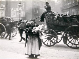 A female newspaper seller, London