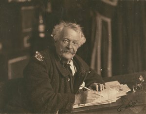 Félix Nadar Seated at Writing Table by Paul Nadar