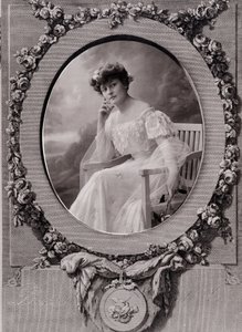 Portrait of a Lady Sitting on an Oval Bench in a Background Decorated with Flowers