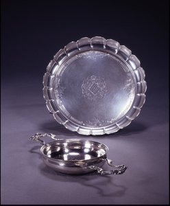 George II orange strainer, circular bowl with two openwork shell and scroll handles by Paul de Lamerie