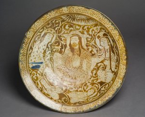 Stone-paste dish decorated in golden lustre, from Kashan, Iran, early 13th century