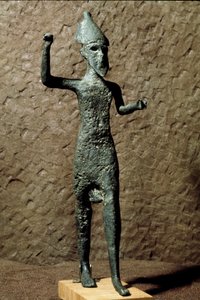 Phoenicia: figurine of a god in bronze. Found in the sea near Selinunte, Sicily. 14th-13th century BC by Phoenician