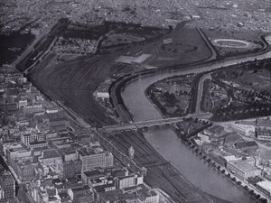 Melbourne: An aerial view of the Jolimont Railway Yards and the River Yarra, Showing a small section of the city and Richmond in the distance by Photographer Australian
