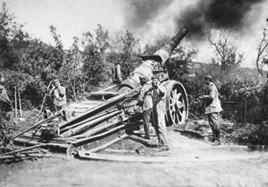 German Soldiers Firing a Heavy Cannon by Photographer German