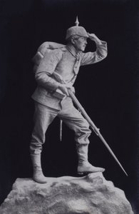 Sculpture of a First World War German soldier looking across the battlefield