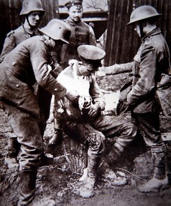 WWI German medical orderly tending a wounded British soldier on the Western Front