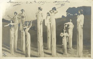 Women on stilts dressed as asparagus