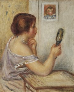 Marie Dupuis holding a mirror with a portrait of Coco