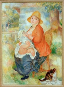 Maternity. Woman Breastfeeding Her Child