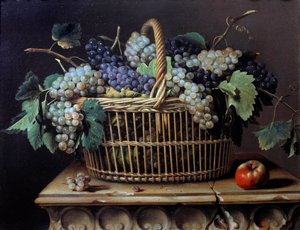 Still life of a bunch of grapes in a basket