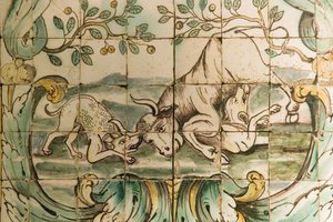 Majolica tiles depicting dogs attacking a bull, from The Hunting Room at Palacio da Praia, Belem, c.1680 by Portuguese School