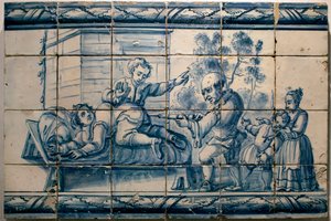 The doctor doing an enema to a patient - Satirical panel of Lisbon, first half 18th century - Musee national des azulejos, Lisbon (Portugal)