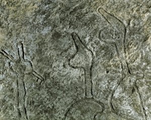 Prehistory, rock art: petroglyph of a hunting scene representation. Neolithic, Stone Age. Baku, Azerbaijan State Religion History Museum by Prehistoric Prehistoric