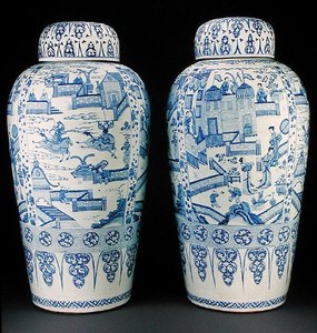 A pair of blue and white soldier vases by Qing Dynasty Chinese School
