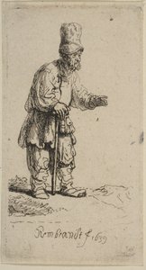 A Peasant in a High Cap, Standing Leaning on a Stick by Rembrandt van Rijn
