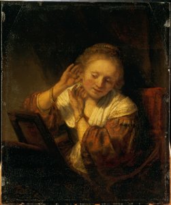 Young Woman Adorning Herself with Earrings
