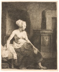 Woman Sitting Half Dressed Beside a Stove by Rembrandt van Rijn