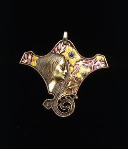 A pendant depicting a young maiden