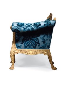 A George III giltwood sofa by Robert Adam