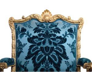 One of a pair of George III giltwood armchairs by Robert Adam