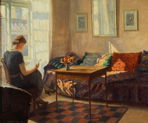 A Woman Reading at a Window