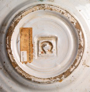 White tin-glazed side plate by Roger Eliot Fry