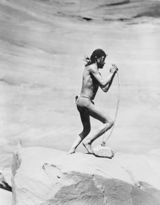 Navajo Indian Stringing the Bow