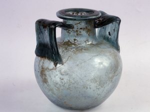 Blue glass cinerary urn with striated handles