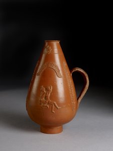 Piriform jug with applied decoration of leopard or cheetah attacking a convict, drunken Pan raping a maenad