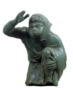 Roman Art: Bronze Statuette of Black Slave Kneeling and Blowing
