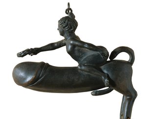 Sasamon Phallus. 1st c. Animal with Chest, Legs and Tail Shaped Glans, Mounted by a Woman with Laurel Wreath. Amulet Against the Evil Eye. Roman Art. Early Empire. Sculpture on Bronze. Spain. Catalonia. Barcelona. Archaeology Museum of Catalonia by Roman Roman
