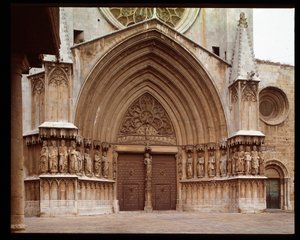 Gothic Art: (detail) of the central portal of the Cathedral of St. Thecla in Tarragona by Romanesque
