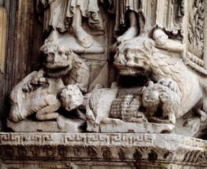 Monsters. Carved support of a column by Romanesque
