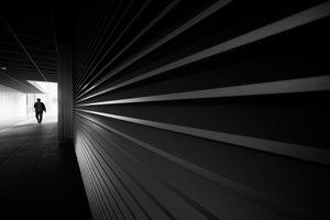 Lone Figure In Tunnel