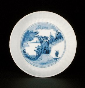 Blue and white kraak saucer dish painted with a figure in a landscape, Egret mark, Wanli or Tianqi by School Chinese