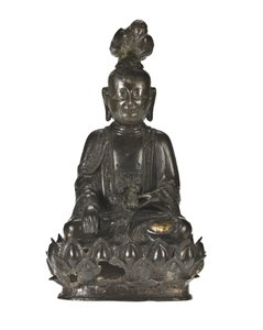 Figure of Guanyin, the Chinese goddess of mercy seated on a lotus design base with a raven perched on her head and a rabbit resting in her left hand by School Chinese