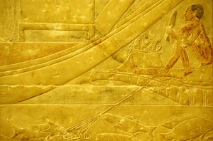 Ancient Egypt, Wall carving/painting, Mastaba/Tomb of Idout, Saqqara, 2323-2150 BC, A fisherman scaling fish and holding a four-pronged spear by School Egyptian