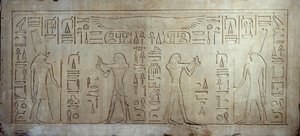 Egyptian antiquity: limestone stele depicting King Sesostris III as a young man, on the right, an aged man offers bread and cake to the god Montu