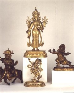 Sino-Tibetan gilt brass figure of Padmapani; East Tibetan gilt bronze figure of Dam-can Dor-je Legs-pa; Sino-Tibetan figure of Syamatara; polychrome figure of Vajravavali
