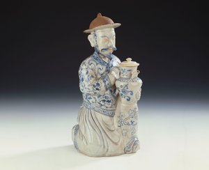 An unrecorded Annamese blue and white ewer formed as a kneeling attendant