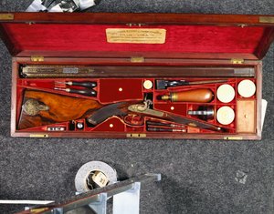 A Gold Decorated 16 Bore D.B. Percussion Rifle Made for the Nizam of Hyderabad, in a Brass Mounted Mahogany Case, Lined in Crimson Silk, c.1855 by Scottish School