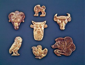 Clothing ornament plaques showing Greek influence