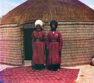 Two Men Standing on a Rug, in Front of Yurt