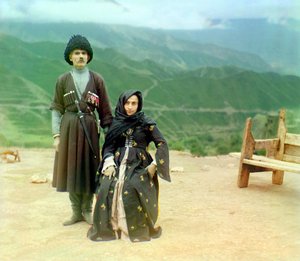 Dagestani Types – A Man with Medals and a Dagger and a Woman in Black Dress, Russian Empire