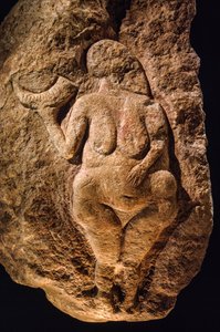 The Venus of Laussel, carving of a pregnant woman, approximately 25,000 years old